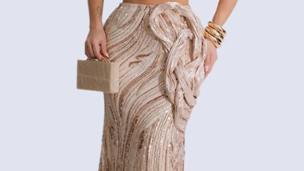 Sequins outfits for women: one-shoulder sequin crop top and maxi skirt set