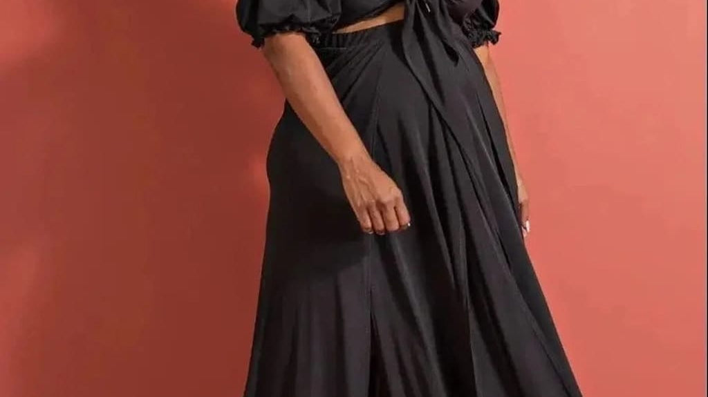 Black surplice top and long maxi skirt set