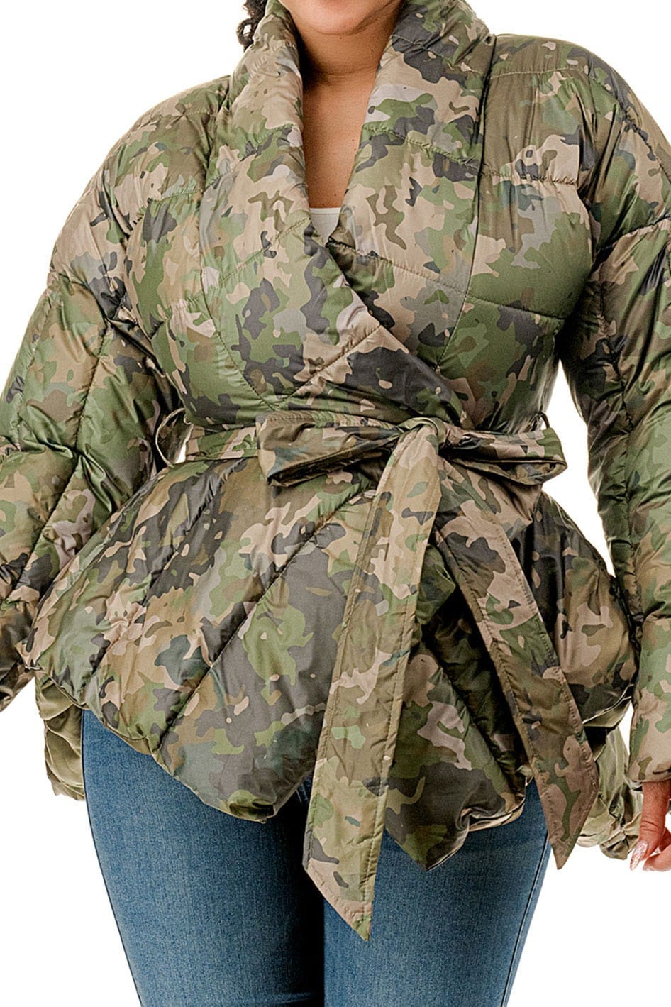 Women's plus size camo puffer jacket with belt on model