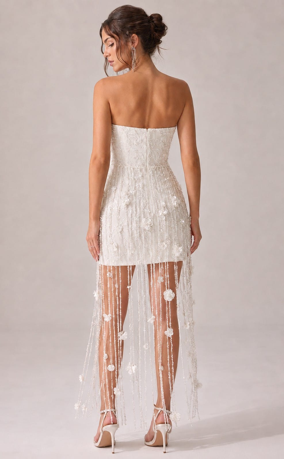 Women's white strapless corset dress with embellished overlay - back