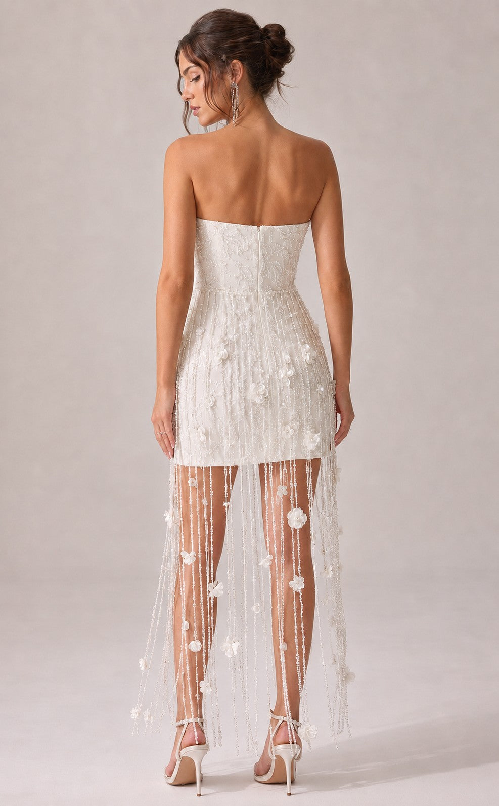 Women's white strapless corset dress with embellished overlay - back