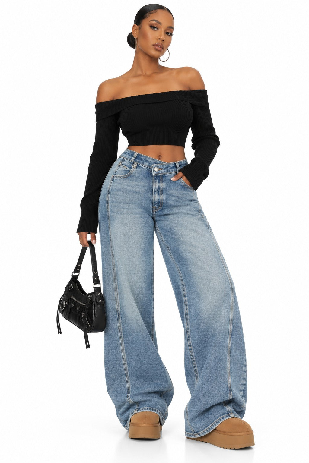 Women's wrap front barrel leg jeans on model
