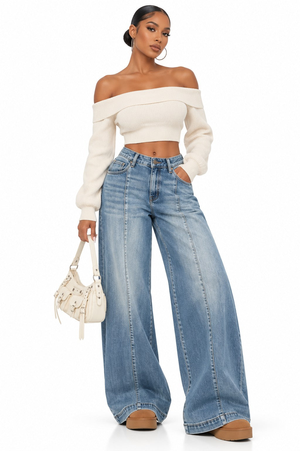 Women's side pleat wide leg jeans on model