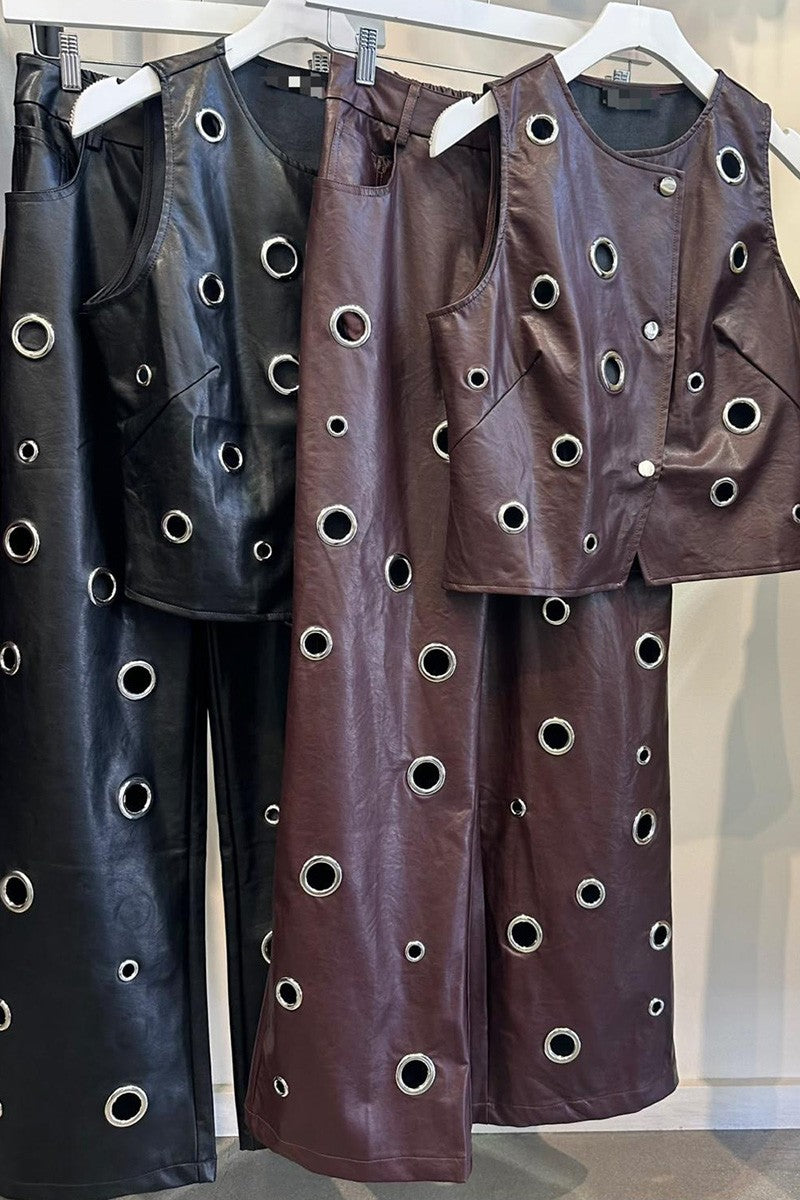 Faux leather vest and pants set flat lay