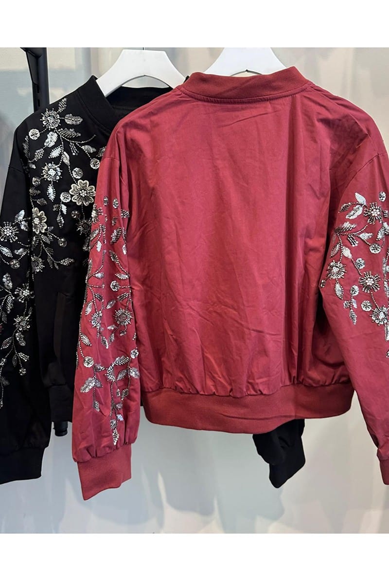 Burgundy sequin bomber jacket flat lay