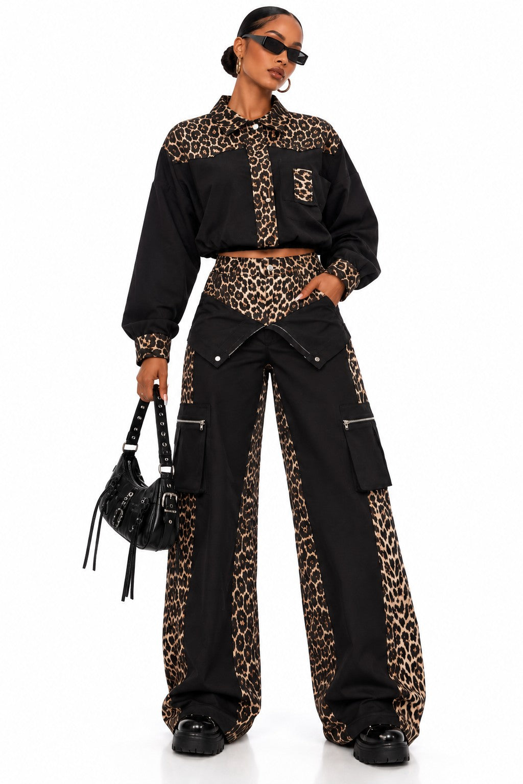 Women's black and leopard fold-over cargo pants on model