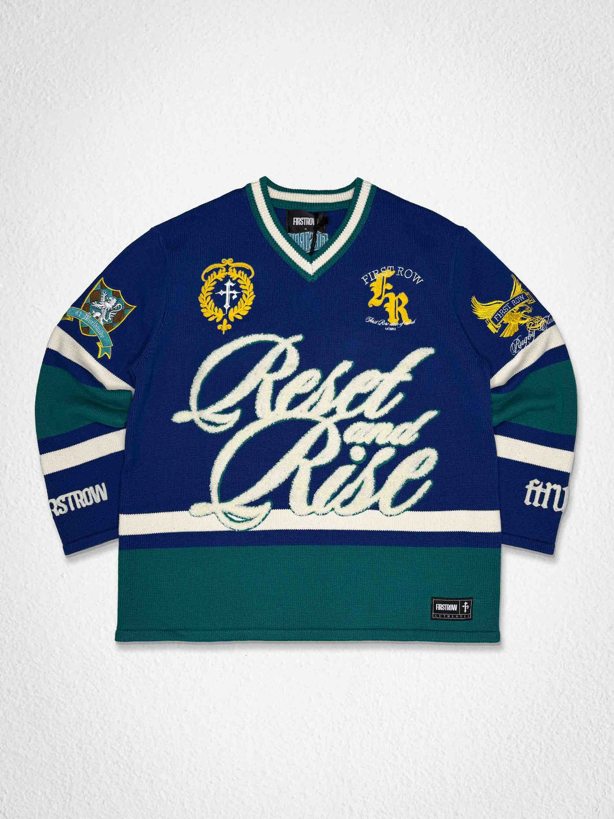 Men's blue stadium sweater with embroidered script and patch details