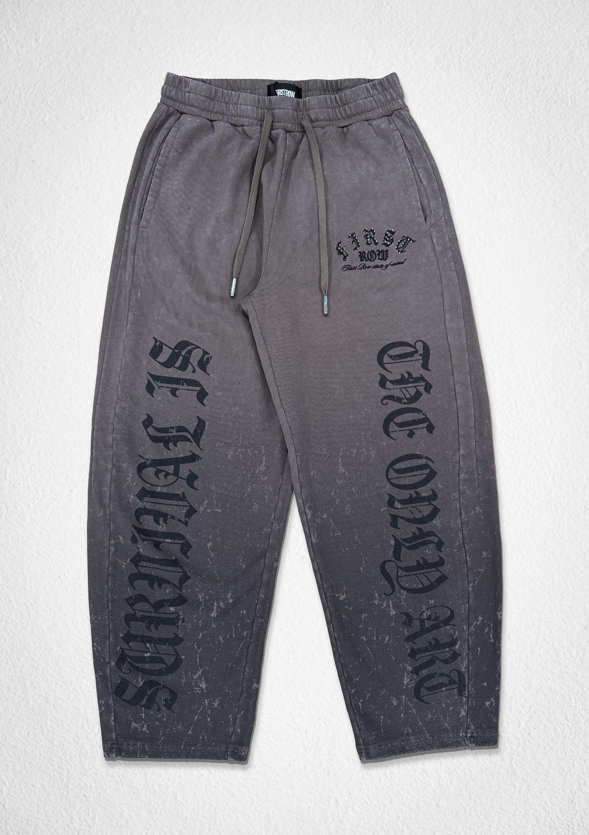 Men's caffe brown washed baggy joggers with flocked gothic graphic