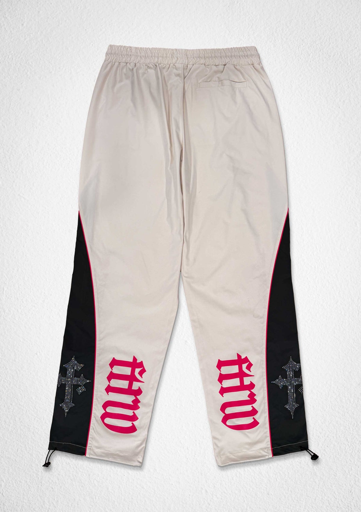 Men's ecru paneled track pants with patch detail