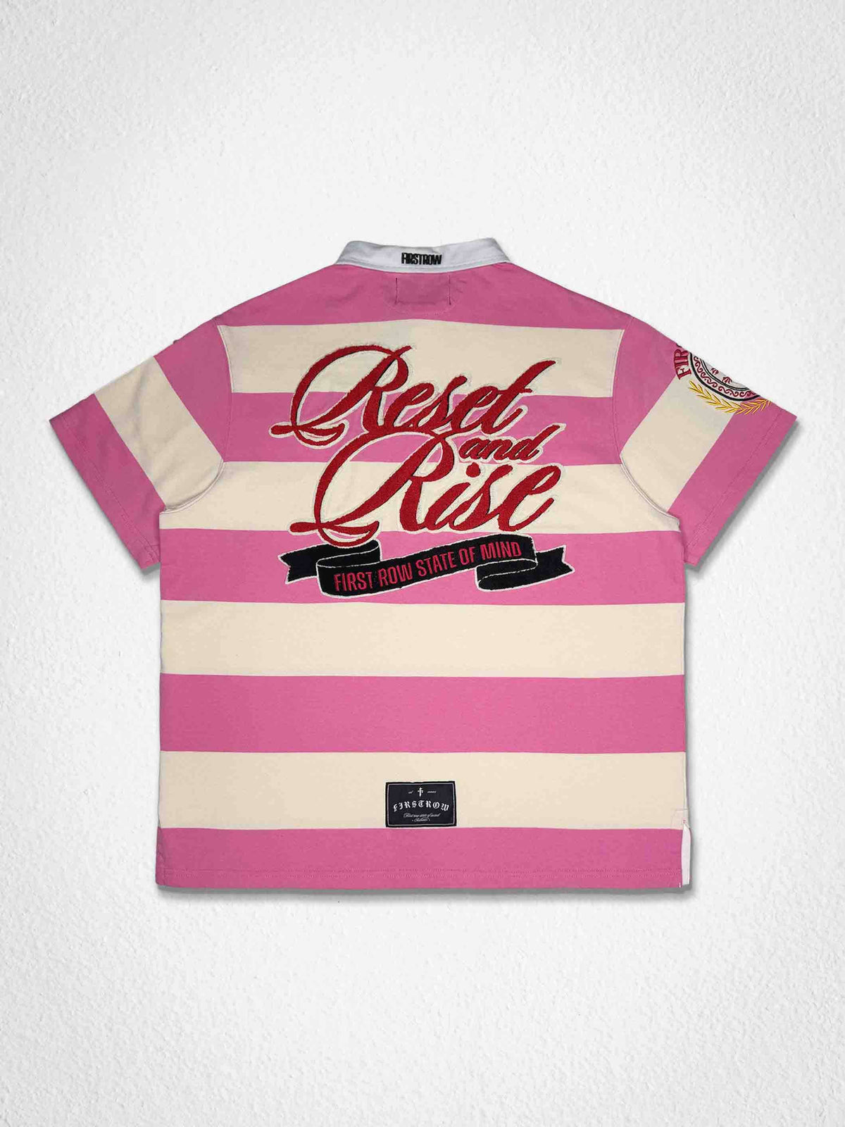 Men's pink washed club polo with rhinestone floral appliqué and embroidery
