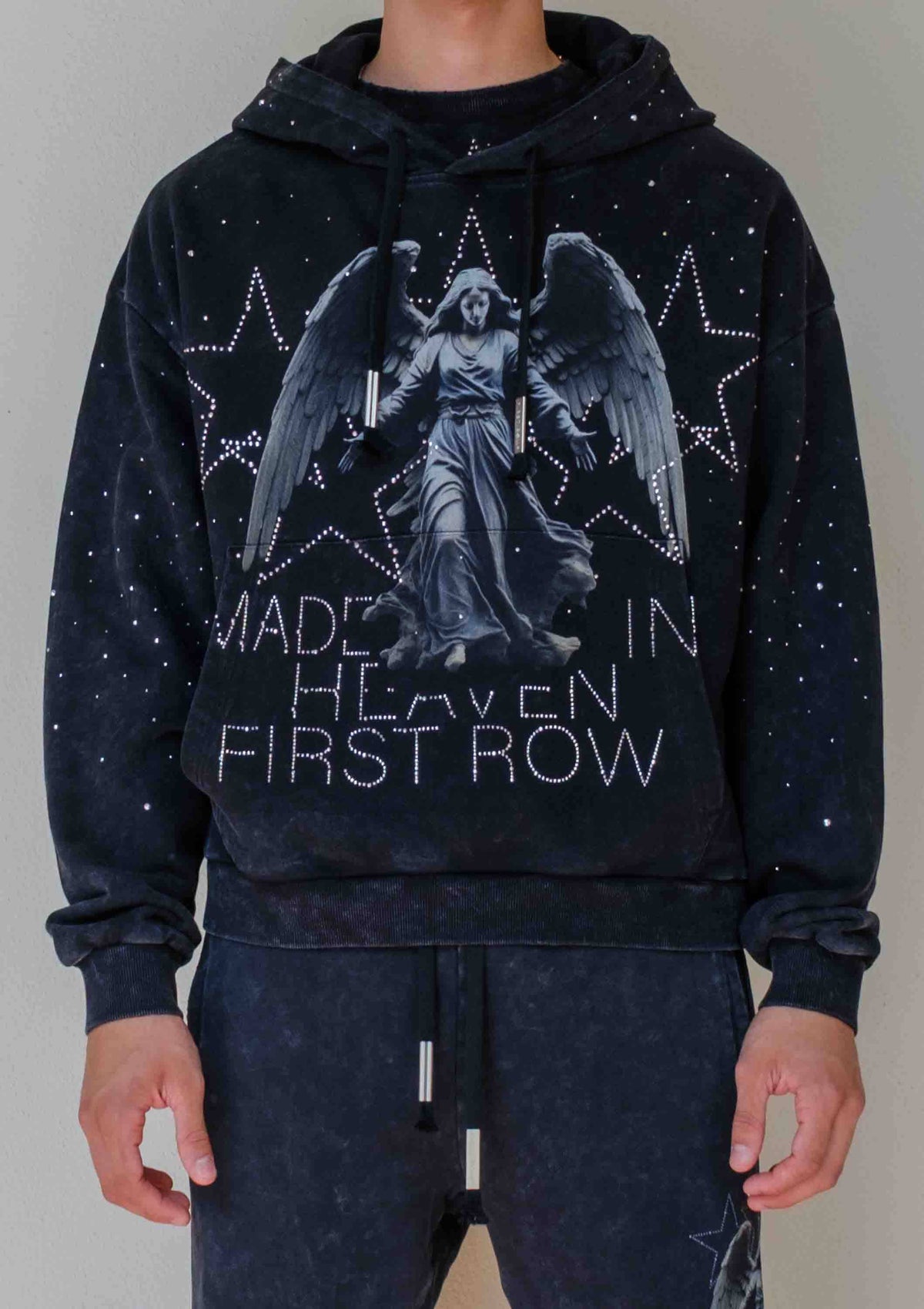 Men's black washed cotton pullover hoodie with rhinestone studded angel graphic and kangaroo pocket