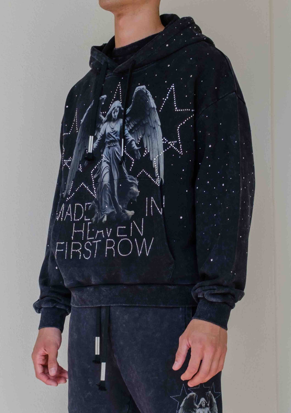 Men's black washed cotton pullover hoodie with rhinestone studded angel graphic and kangaroo pocket