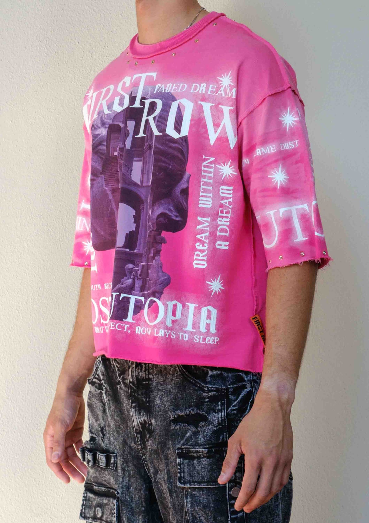 Men's pink cropped terry tee with studded rubber graphic