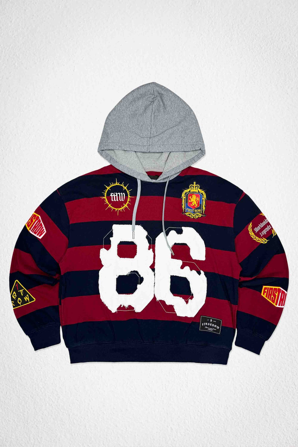 Men's burgundy pullover hoodie with varsity 86 applique and patch details