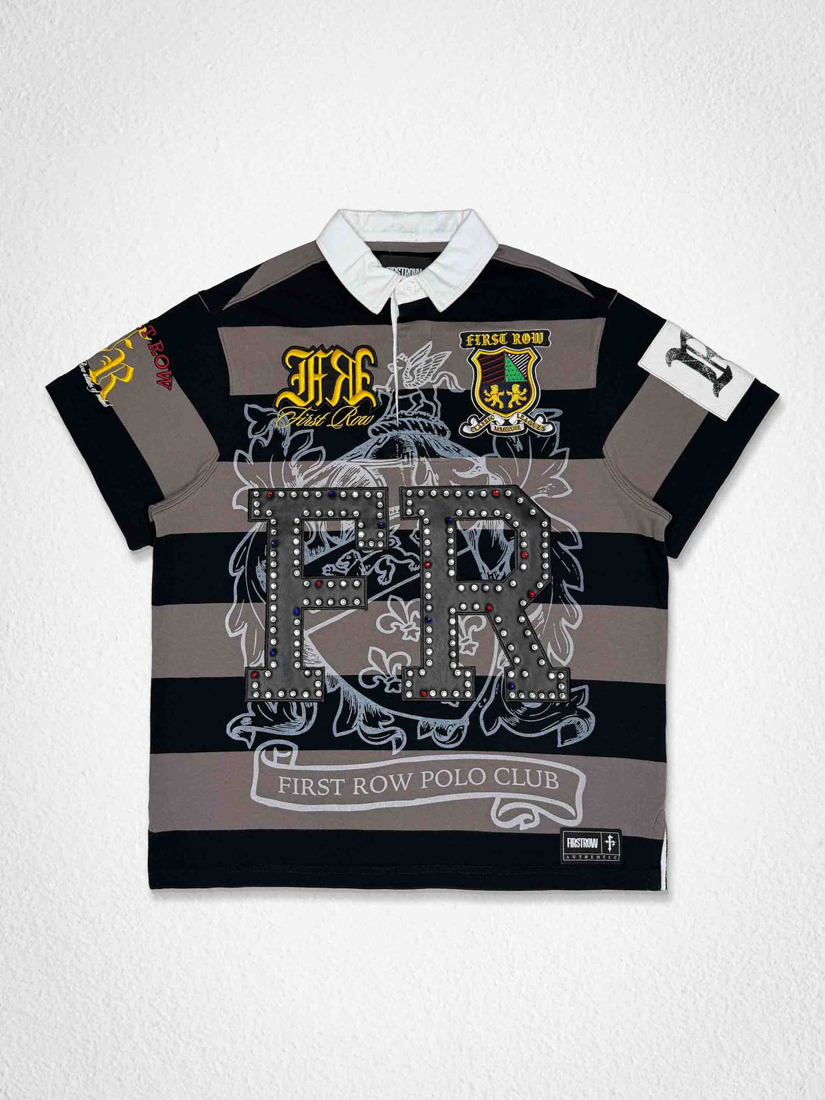 Men's black washed cotton polo with leather appliqué heraldry crest patches