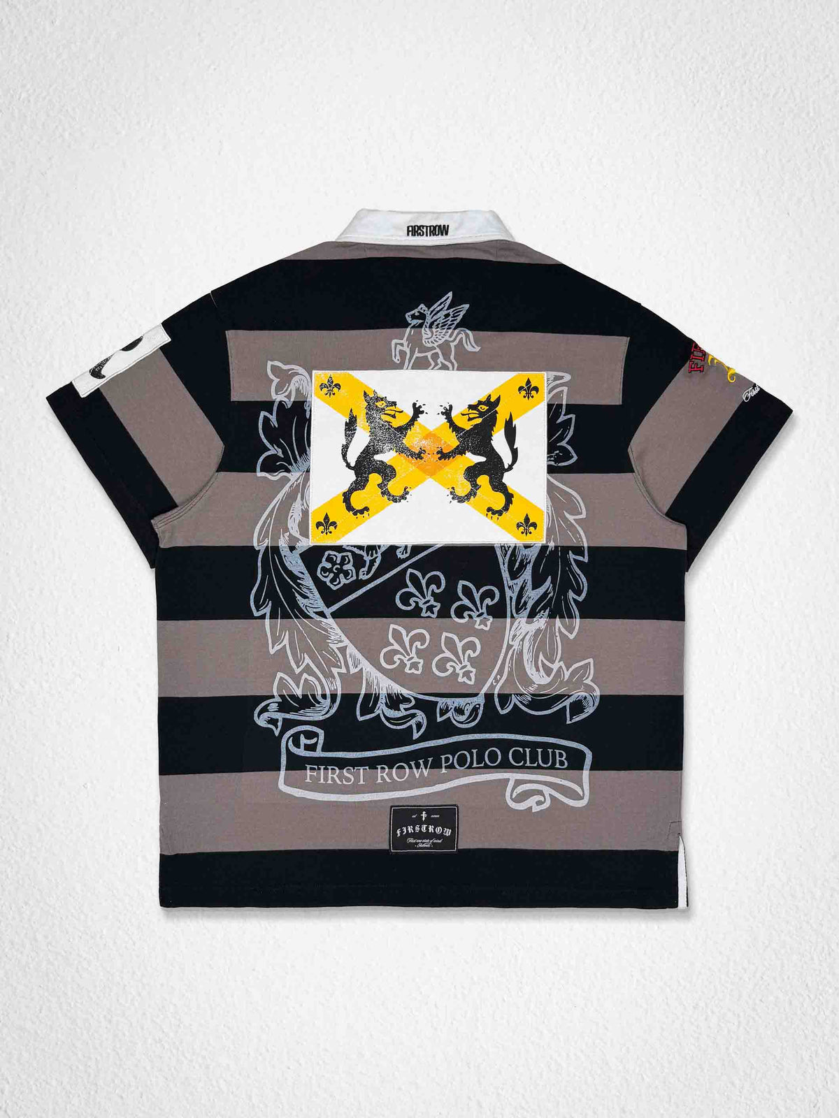 Men's black washed cotton polo with leather appliqué heraldry crest patches