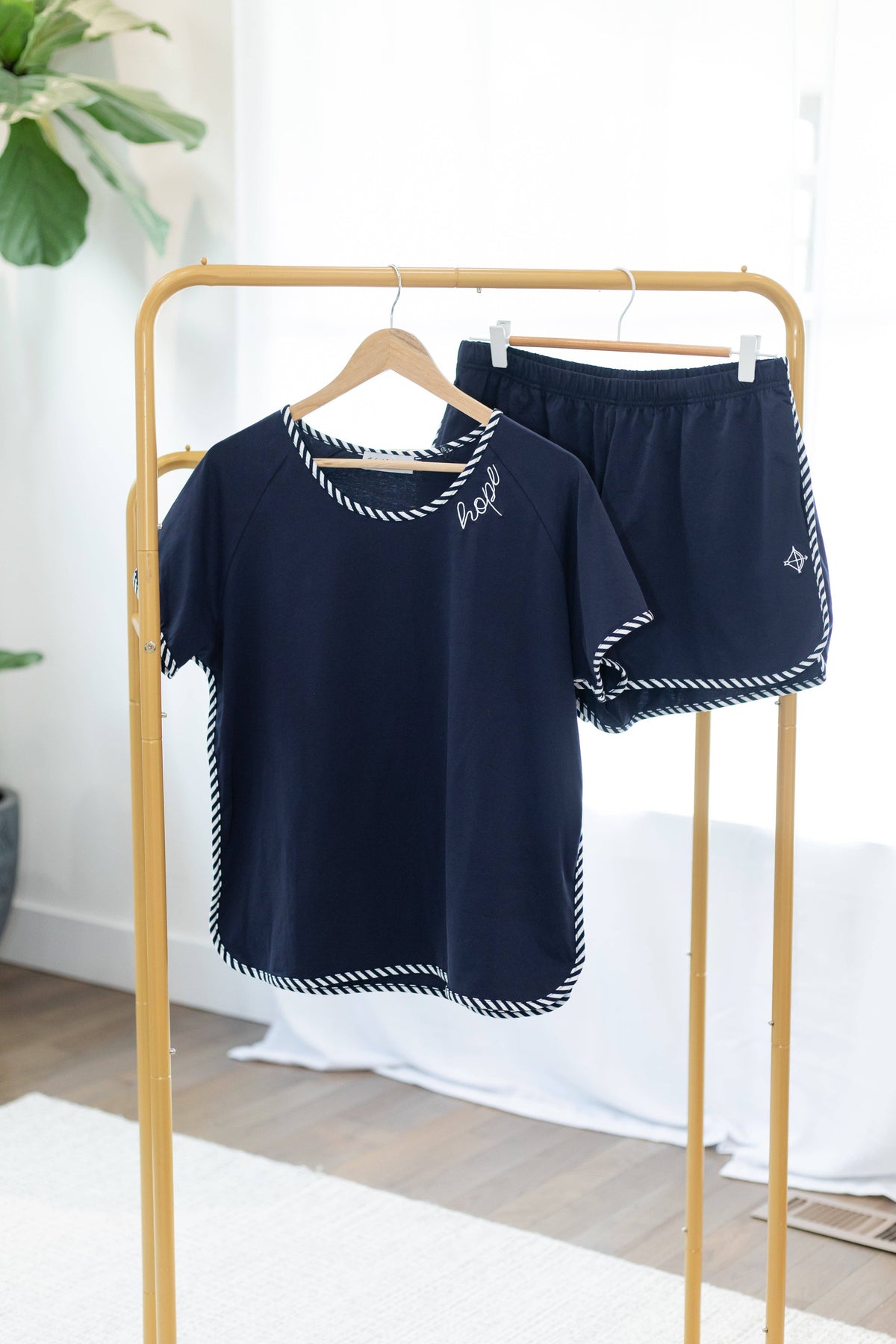 Women's navy cotton pajama short set with embroidered Hope detail and striped piping