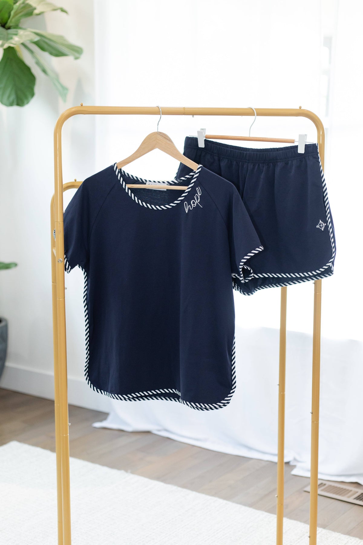 Women's navy cotton pajama short set with embroidered Hope detail and striped piping