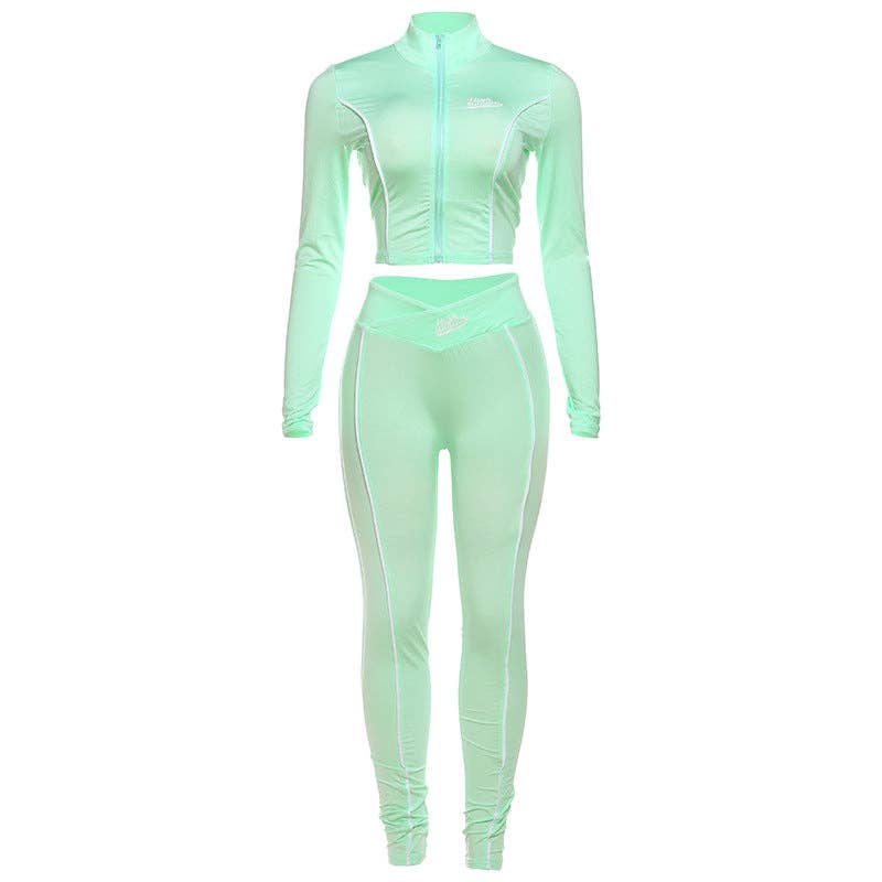 Women's black cropped long sleeve top and slim-fit pants set, view 2
