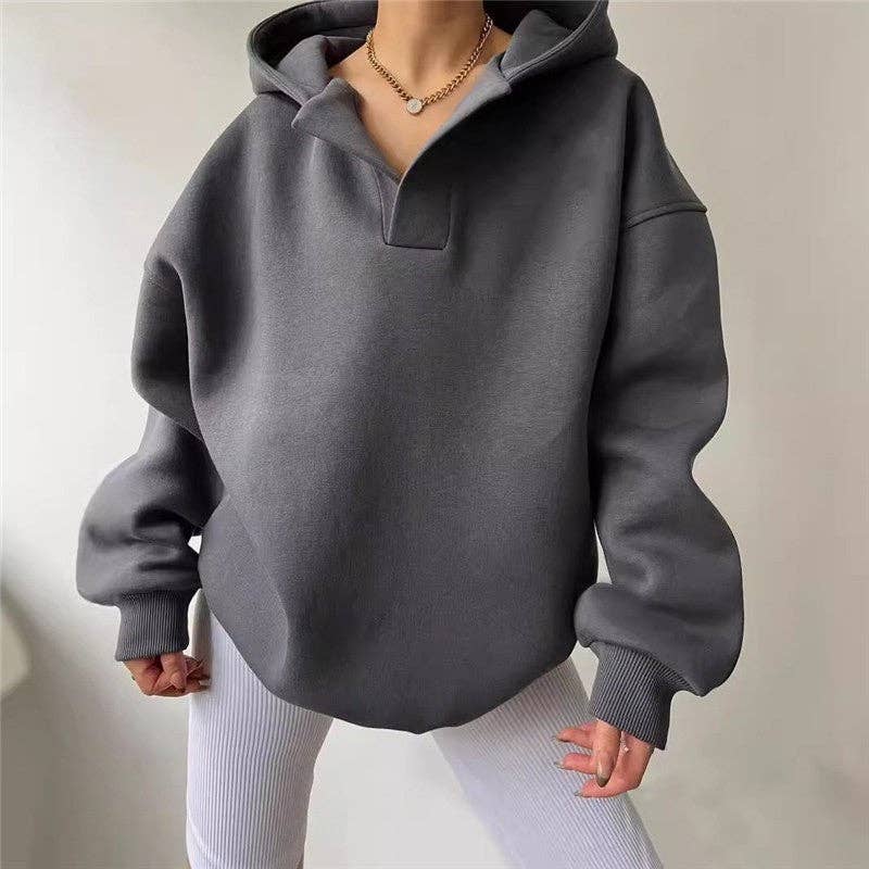 Women's oversized purple solid hooded pullover sweatshirt – styled view