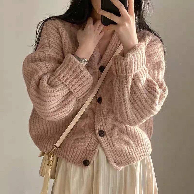 Women's oversized V-neck jacquard knit cardigan sweater in pink, gray or cream – front view