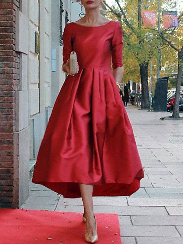 Women's pleated A-line round neck midi dress with pockets in red, green or black – front view