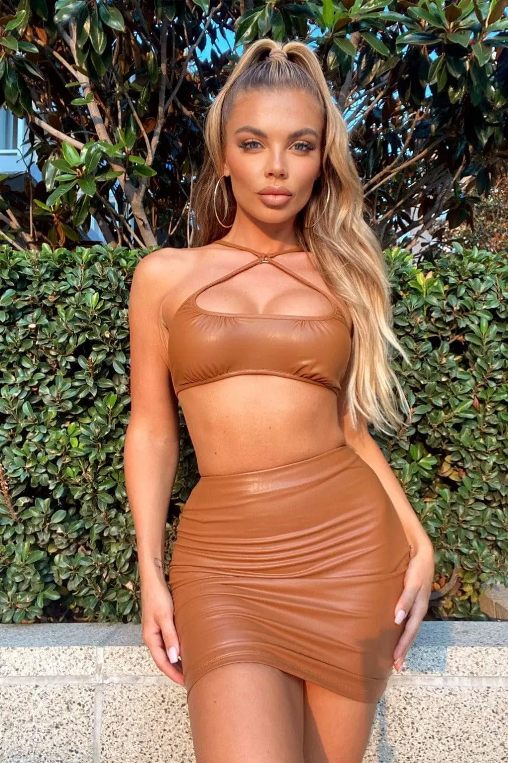 Brown faux leather skirt set styled for a fall outfit