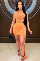 Women's orange cutout halter top and mini skirt set