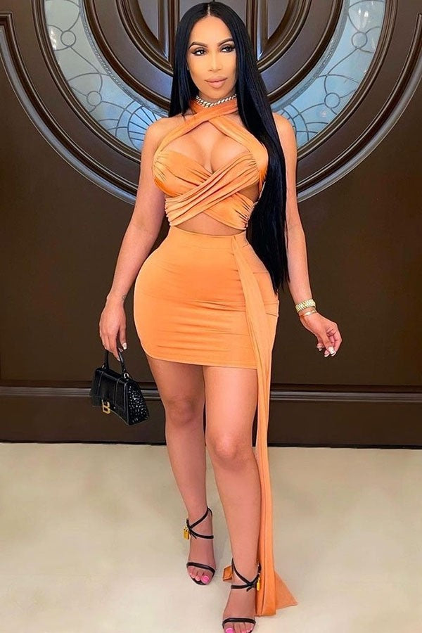 Women's orange cutout halter top and mini skirt set