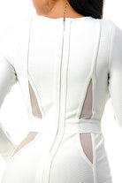 Back detail on women's white long sleeve mesh cut-out bandage mini dress