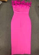 Feather-trim neckline detail on women's hot pink bandage midi dress