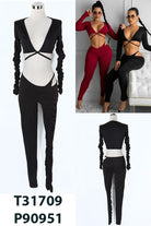 Women's black long sleeve crop top and leggings activewear set