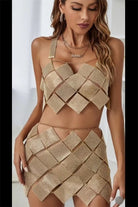 Women's gold sequin halter top and mini skirt set