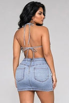Women's light wash denim halter cut-out mini dress - back