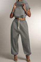 Women's hooded terry sweatshirt and pants set on model