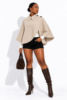 Women's asymmetrical button wrap cape