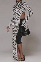 Women's zebra print asymmetrical cut out top
