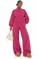 Women's fuchsia piped mock neck top and wide leg trousers set