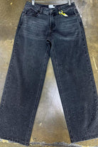Black baggy jeans flat lay