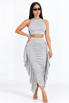 Women's light grey sleeveless top and ruched midi skirt set