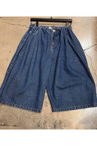 Pleated denim jorts flat lay
