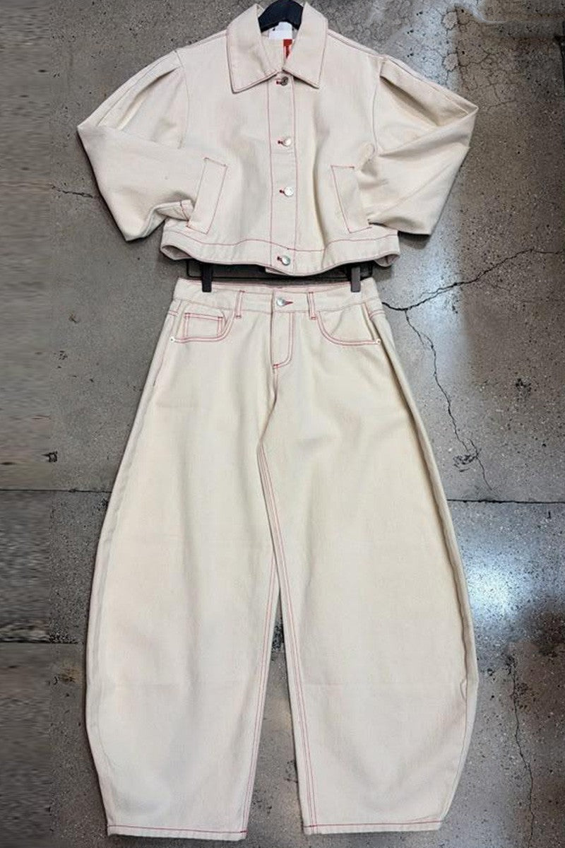 Ecru denim jacket and barrel jeans flat lay
