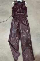 Faux leather vest grommet eyelet detail