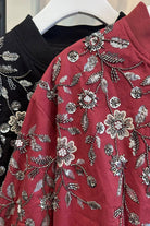 Floral beadwork bomber jacket close up