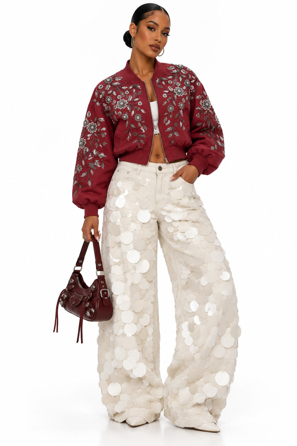 Women's white sequin embellished jeans on model