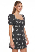 Women's Bow Embroidered Puff Sleeve Mini Dress – detail close-up