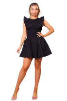 Black ruffled dress side view - Epicplacess