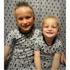 Kids' heather gray rock and roll print short sleeve bamboo pajama set – view 3