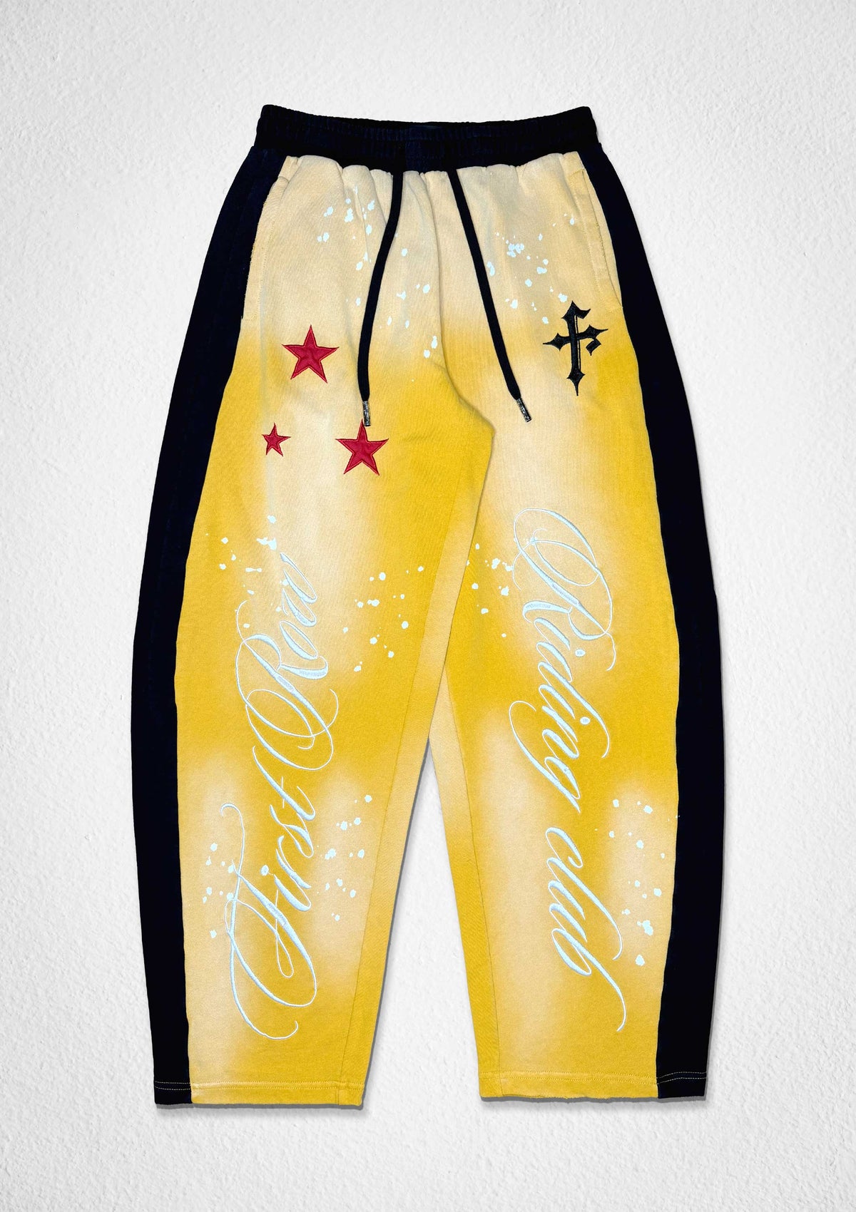 Men's yellow baggy french terry joggers with applique and patch