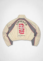 Men's ecru cropped zip track jacket with paneled body and varsity-style patch details - view 2